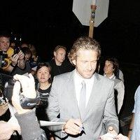 Gerard Butler signs autographs for fans at the 'Machine Gun Preacher' premiere | Picture 84224